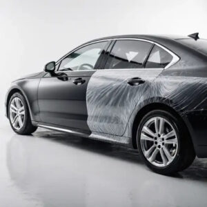 Half car covered with Dupotop Paint Protection Film showing glossy reflection and smooth surface | Dupotop Films